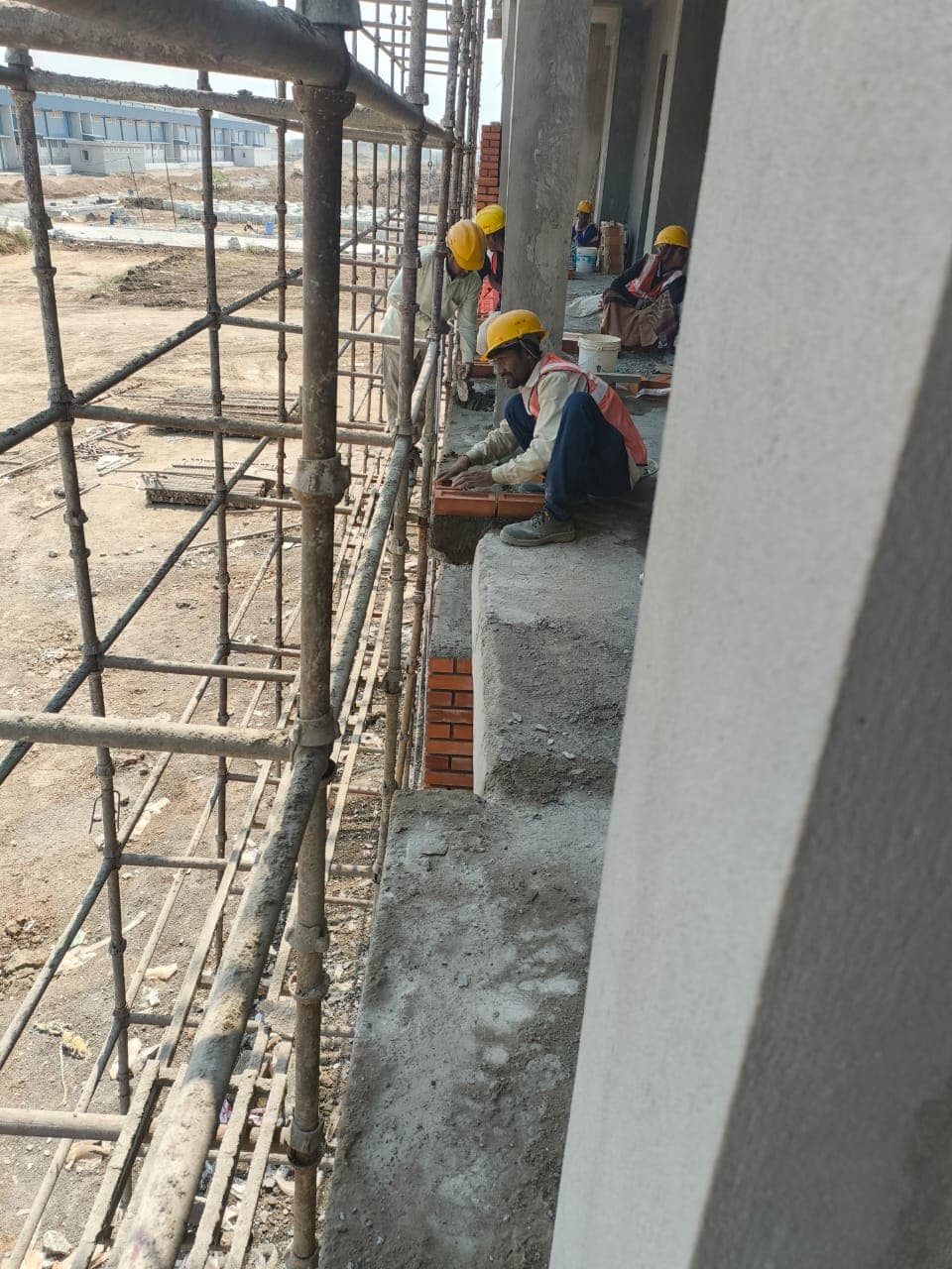 High-Angle Perspective of Scaffolding & Outer Facade