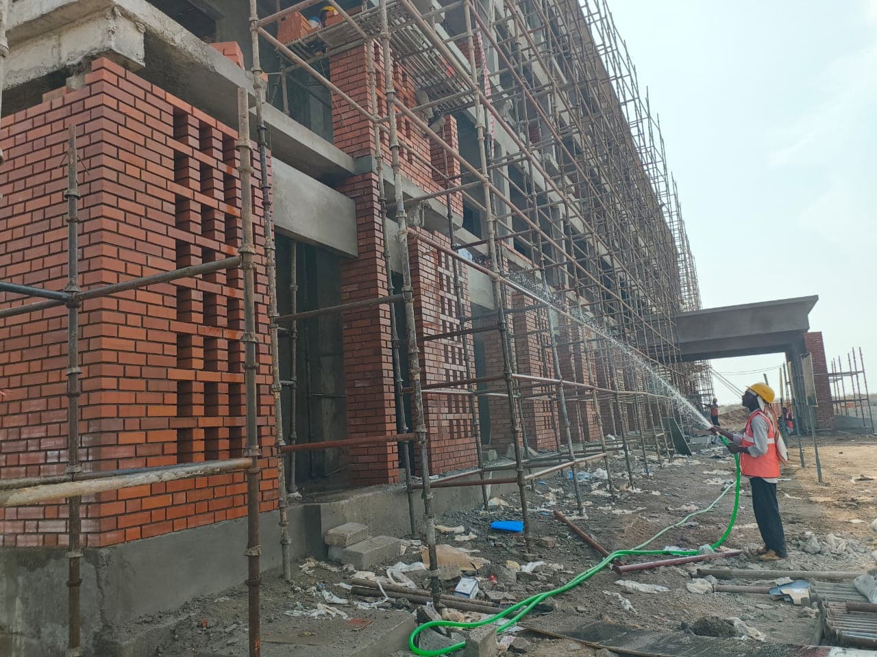 High-Pressure Facade Water Curing in Progress